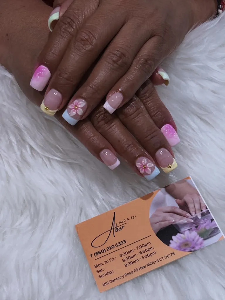 Nail technicians at Camilas Nail Spa in Connecticut
